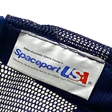 Load image into Gallery viewer, Manufaturers tag view of navy blue vintage 90’s NASA Kennedy Space Center Snapback Trucker Hat with Felt Image.
