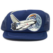 Load image into Gallery viewer, Front view of navy blue vintage 90’s NASA Kennedy Space Center Snapback Trucker Hat with Felt Image.
