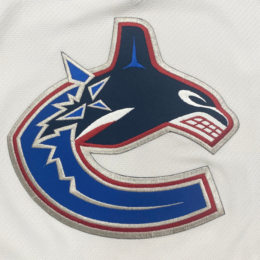 Vintage 90’s CCM NHL Vancouver Canucks White Air-knit Hockey Jersey Men’s Medium