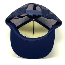 Load image into Gallery viewer, Bottom-inside view of navy blue vintage 90’s NASA Kennedy Space Center Snapback Trucker Hat with Felt Image.
